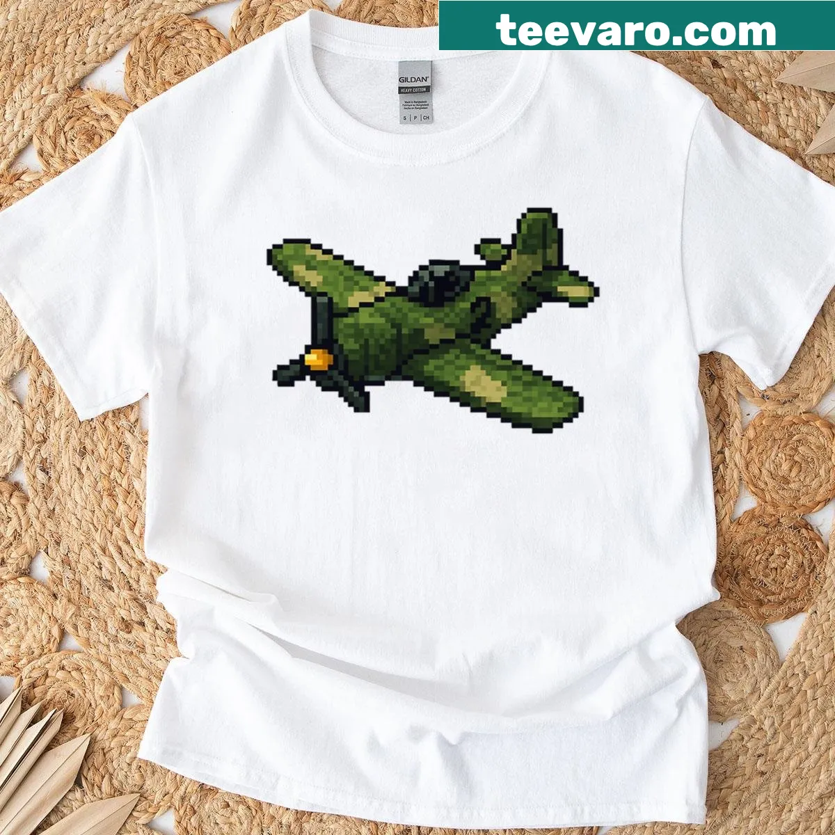 Retro 8-bit fighter plane pixel art t-shirt — on a men's t-shirt