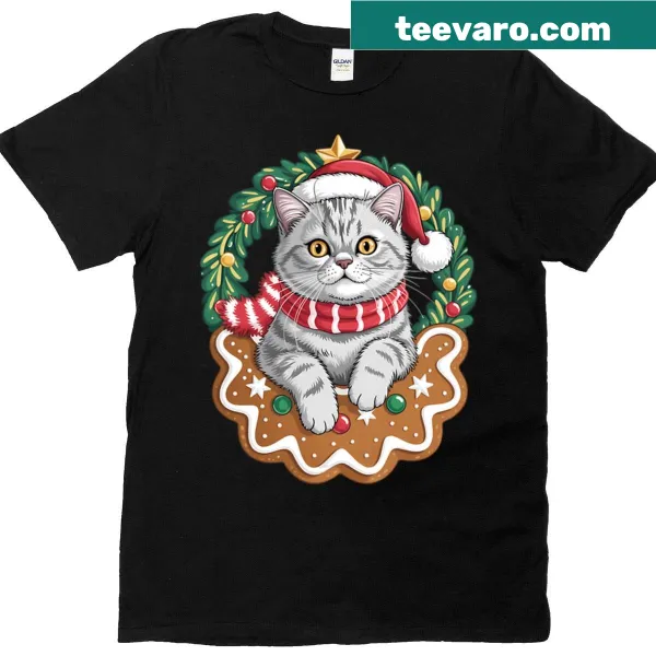 Cartoon of a cat sitting on a gingerbread cookie on a shirt