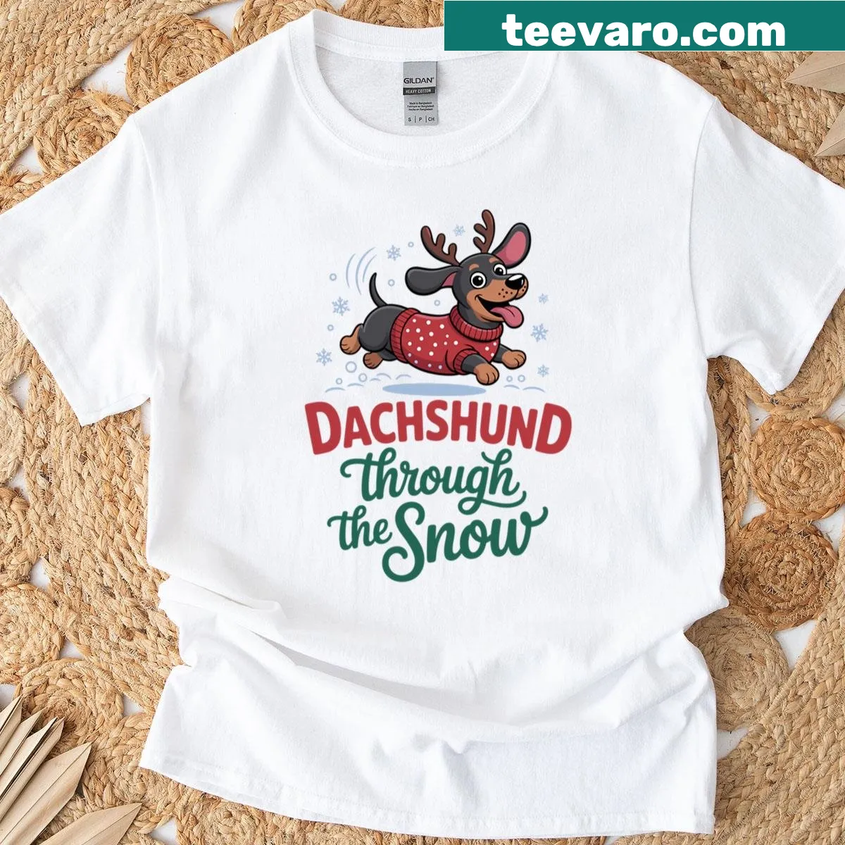 Adorable dachshund t-shirt with a snowy Christmas design featuring a wiener dog. — on a men's t-shirt