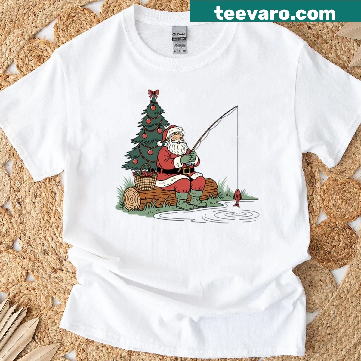 Funny Santa fishing by Christmas tree oversized t-shirt — on a men's t-shirt
