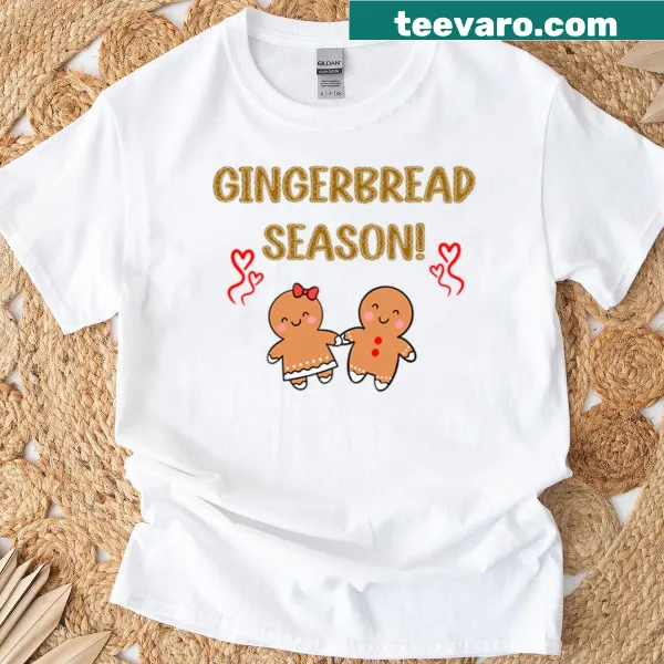 Couple with gingerbread cookies on a cozy Christmas T-shirt