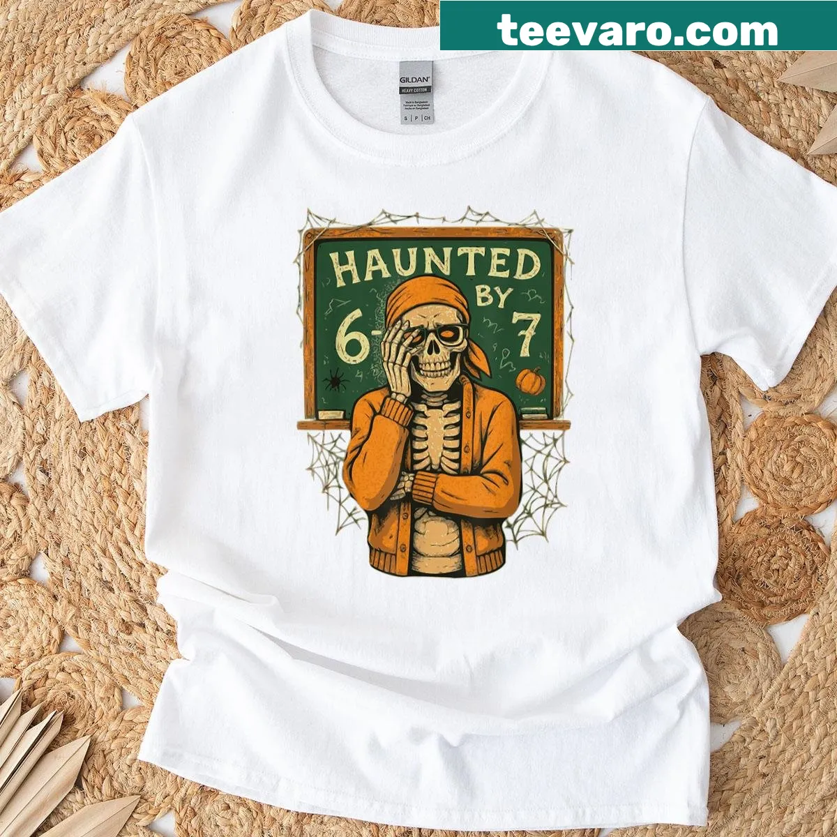 Funny Halloween t-shirt with a skeleton teacher and the phrase 'Haunted By 6-7' — on a men's t-shirt