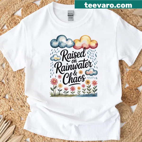 T-shirt featuring 'Raised On Rainwater And Chaos' quote