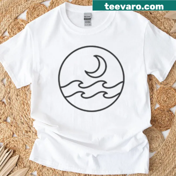 T-shirt depicting a moon over calm ocean waves