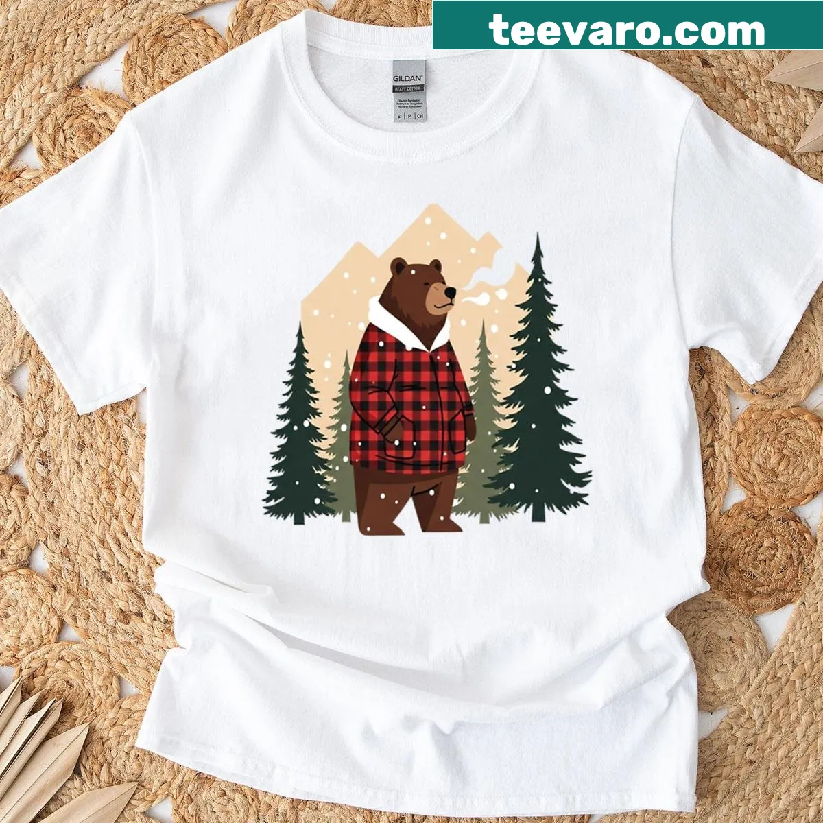 Cozy Christmas T-shirt with a plaid bear illustration — on a men's t-shirt