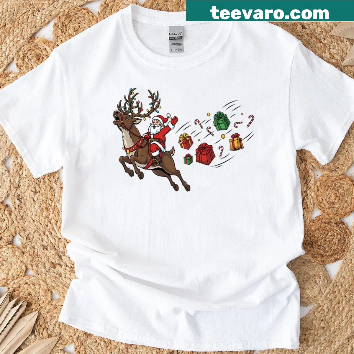 Santa riding a reindeer Christmas t-shirt design — on a men's t-shirt