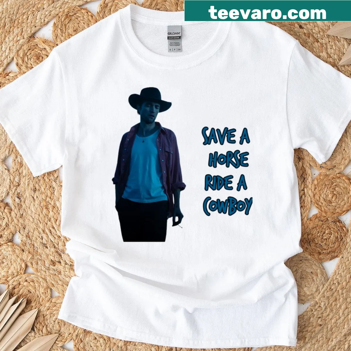 Humorous shirt featuring cowboy-themed text and Robert Pattinson reference. — on a men's t-shirt