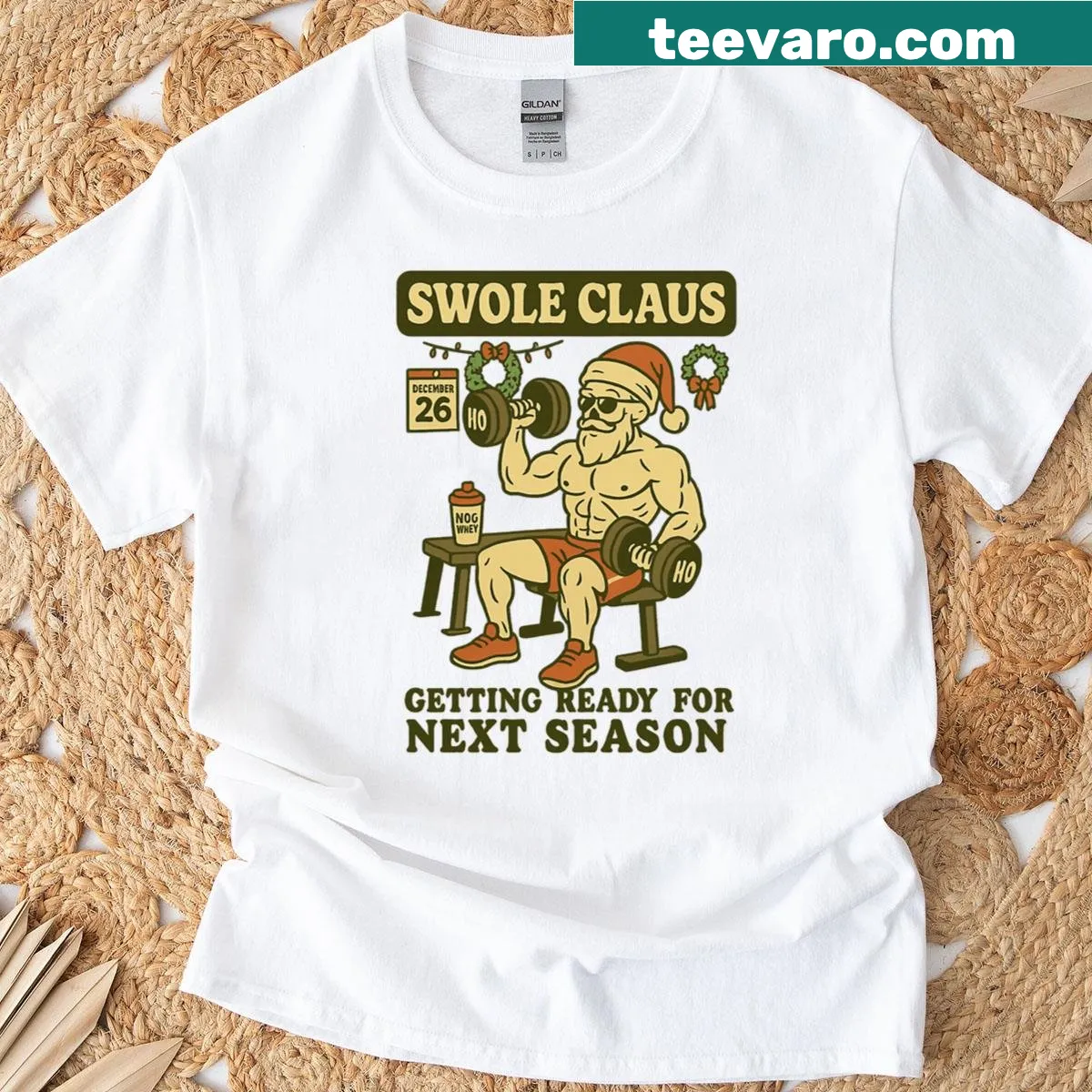 Swole Claus graphic for post-Christmas gym motivation — on a men's t-shirt
