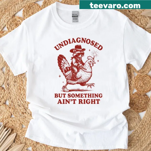 Edgy typography shirt with the phrase 'Undiagnosed But Something Ain't Right.'