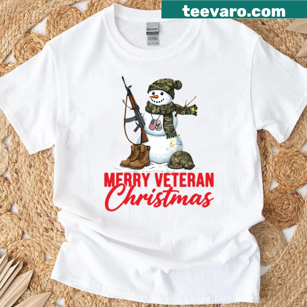 Christmas T-shirt with a snowman in camo boots for veterans — on a men's t-shirt