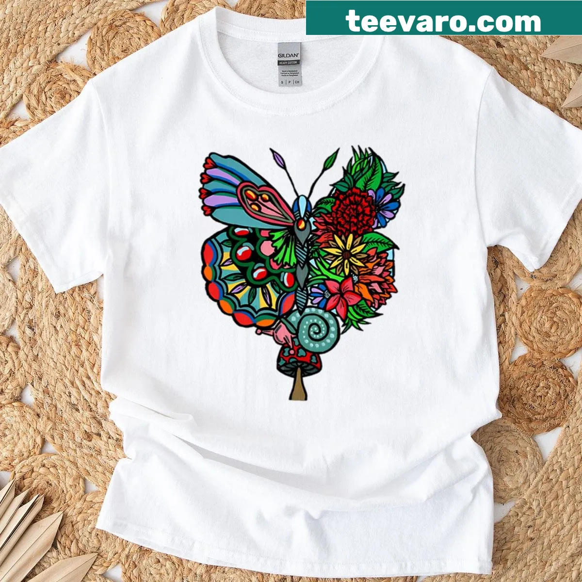 Nature-themed T-shirt featuring graphic elements of landscapes and wildlife. — on a men's t-shirt