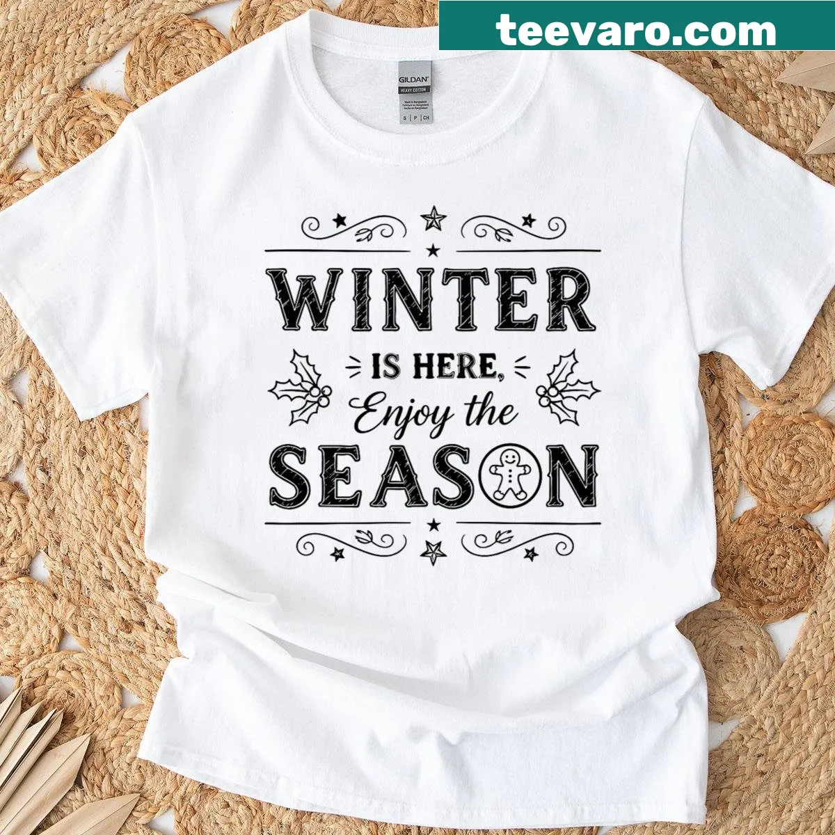 Graphic t-shirt with 'Winter Is Here' quote for cold weather enthusiasts — on a men's t-shirt