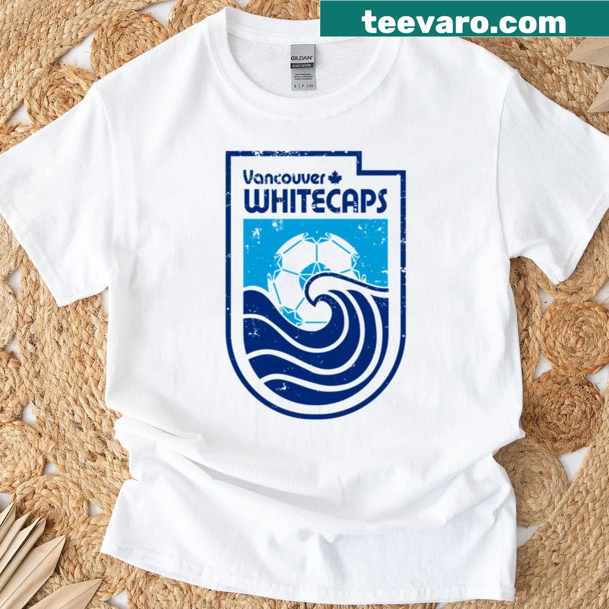 Vintage t-shirt celebrating the 1974 Vancouver Whitecaps soccer team — on a men's t-shirt