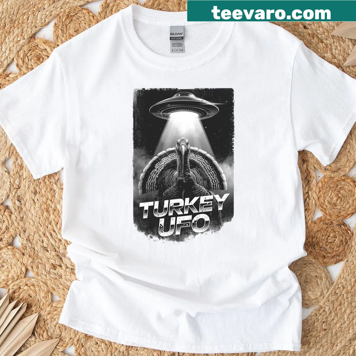 Funny Thanksgiving t-shirt featuring an alien turkey in a UFO — on a men's t-shirt
