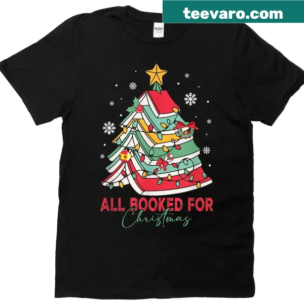 T-shirt featuring a Christmas-themed graphic with books and a tree