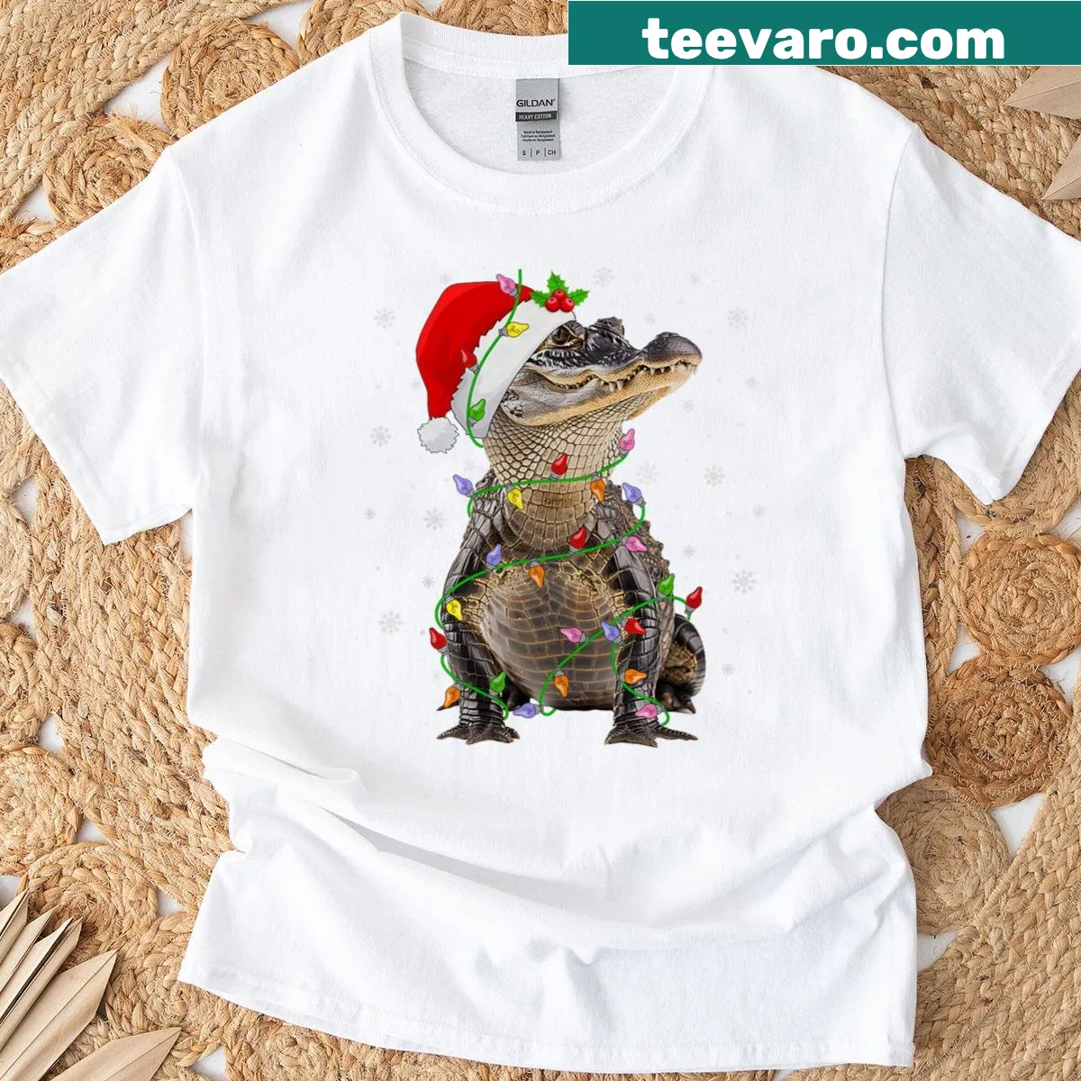 Funny Christmas T-shirt featuring an alligator and crocodile with lights — on a men's t-shirt