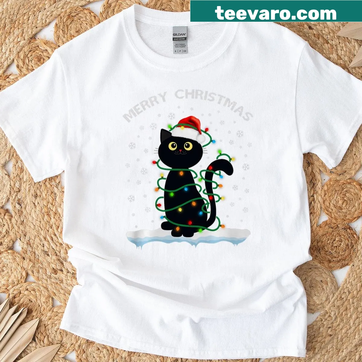 Whimsical black cat with Christmas lights illustration on T-shirt — on a men's t-shirt