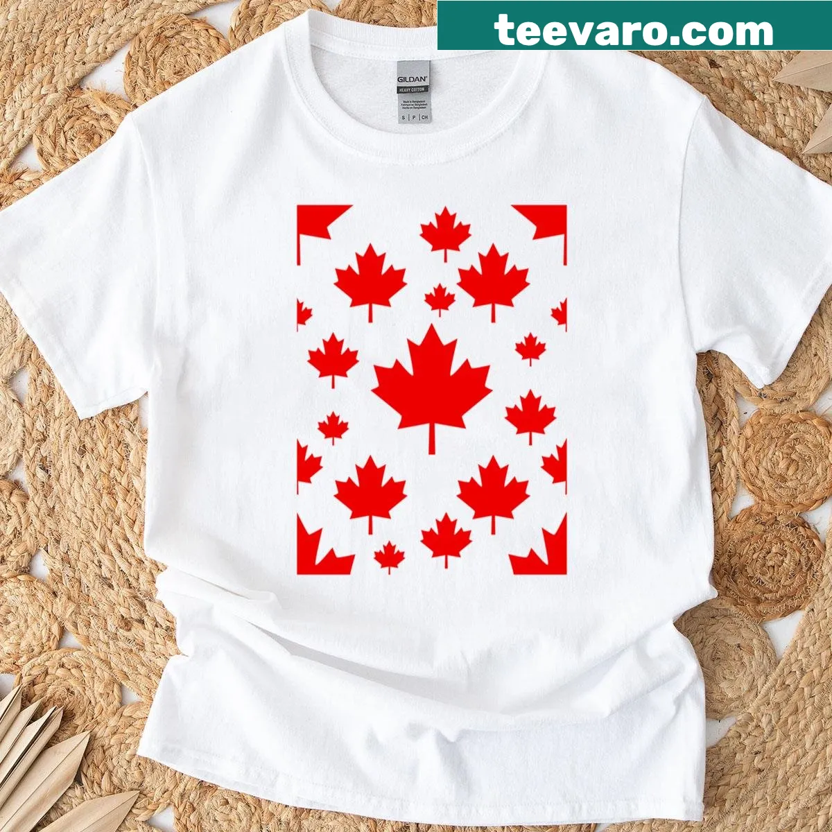 Maple leaf emblem graphic on a t-shirt representing Canada — on a men's t-shirt
