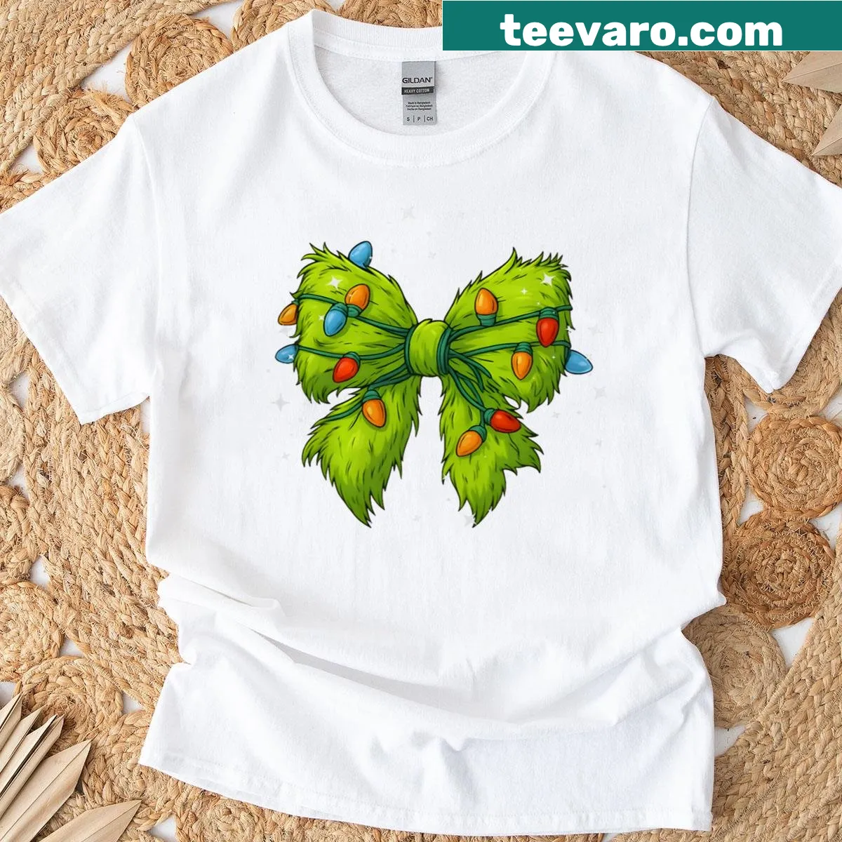 Festive Christmas Tee with bows and holiday lights — on a men's t-shirt