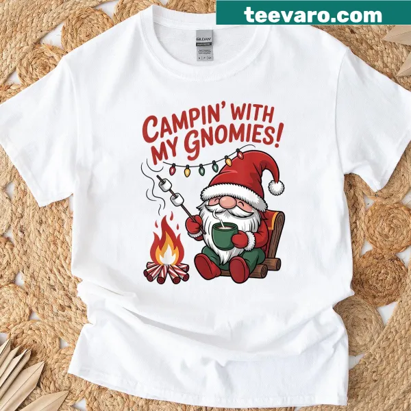 T-shirt featuring Christmas camping gnomes in a festive outdoor scene.