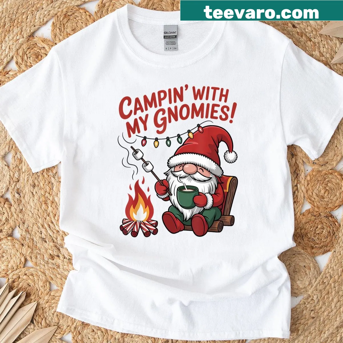 T-shirt featuring Christmas camping gnomes in a festive outdoor scene. — on a men's t-shirt