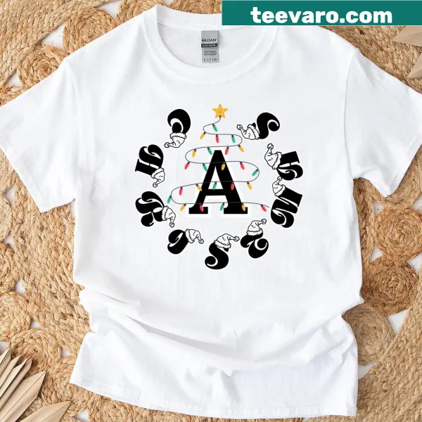 Illustrated Christmas letter and tree lights design on holiday t-shirt