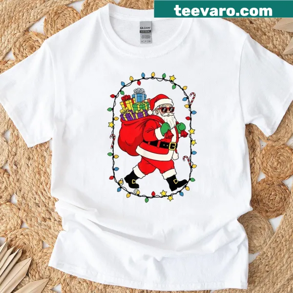Holiday-themed T-shirt featuring Santa Claus, a gift bag, and lights