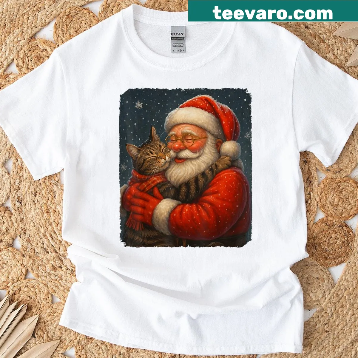 Cute Christmas t-shirt with Santa hugging a cat graphic — on a men's t-shirt