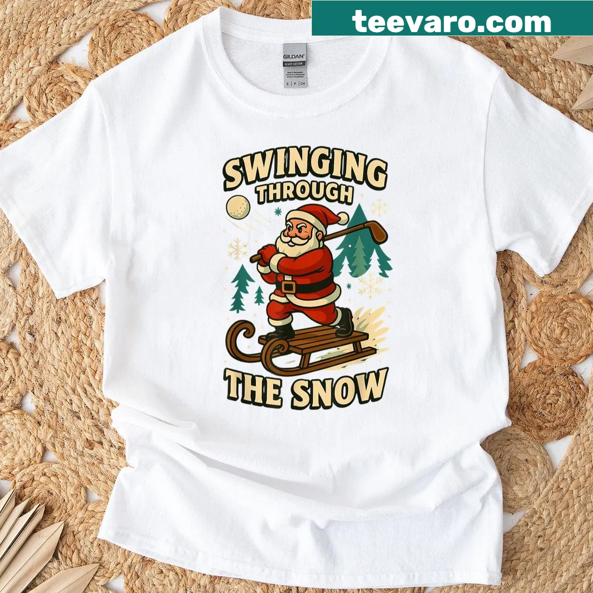 Santa golfing in Christmas attire with festive graphics — on a men's t-shirt