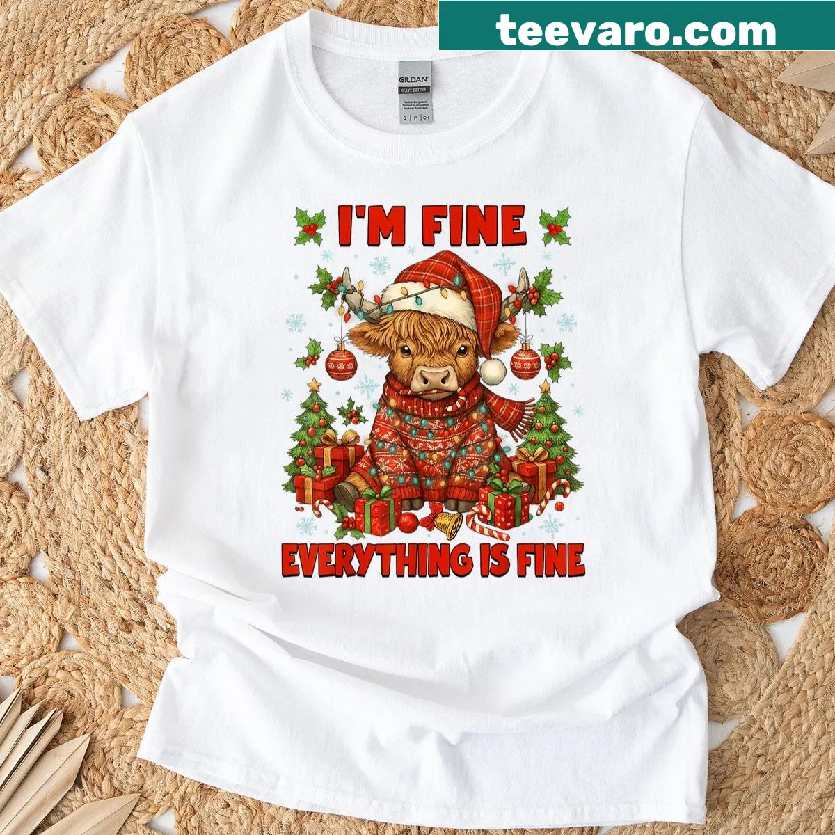 Christmas Highland cow heifer T-shirt with funny holiday phrase — on a men's t-shirt