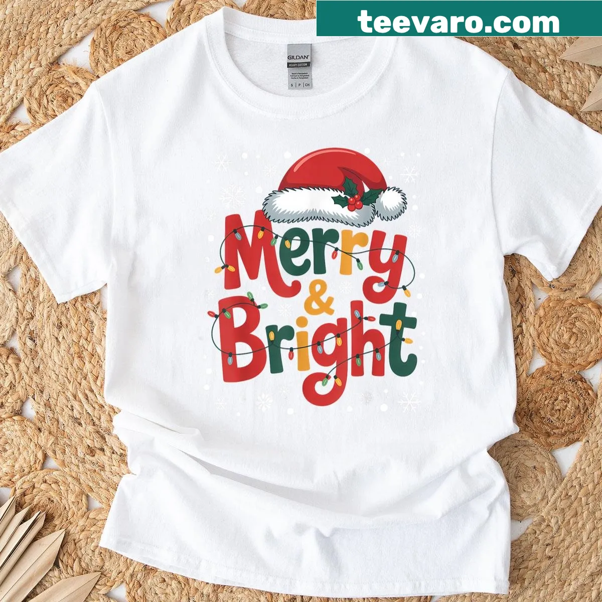 T-shirt with 'Merry And Bright' text and Santa hat illustration — on a men's t-shirt