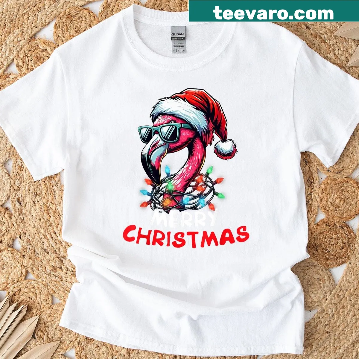 Santa with a flamingo and Christmas lights graphic on a T-shirt — on a men's t-shirt