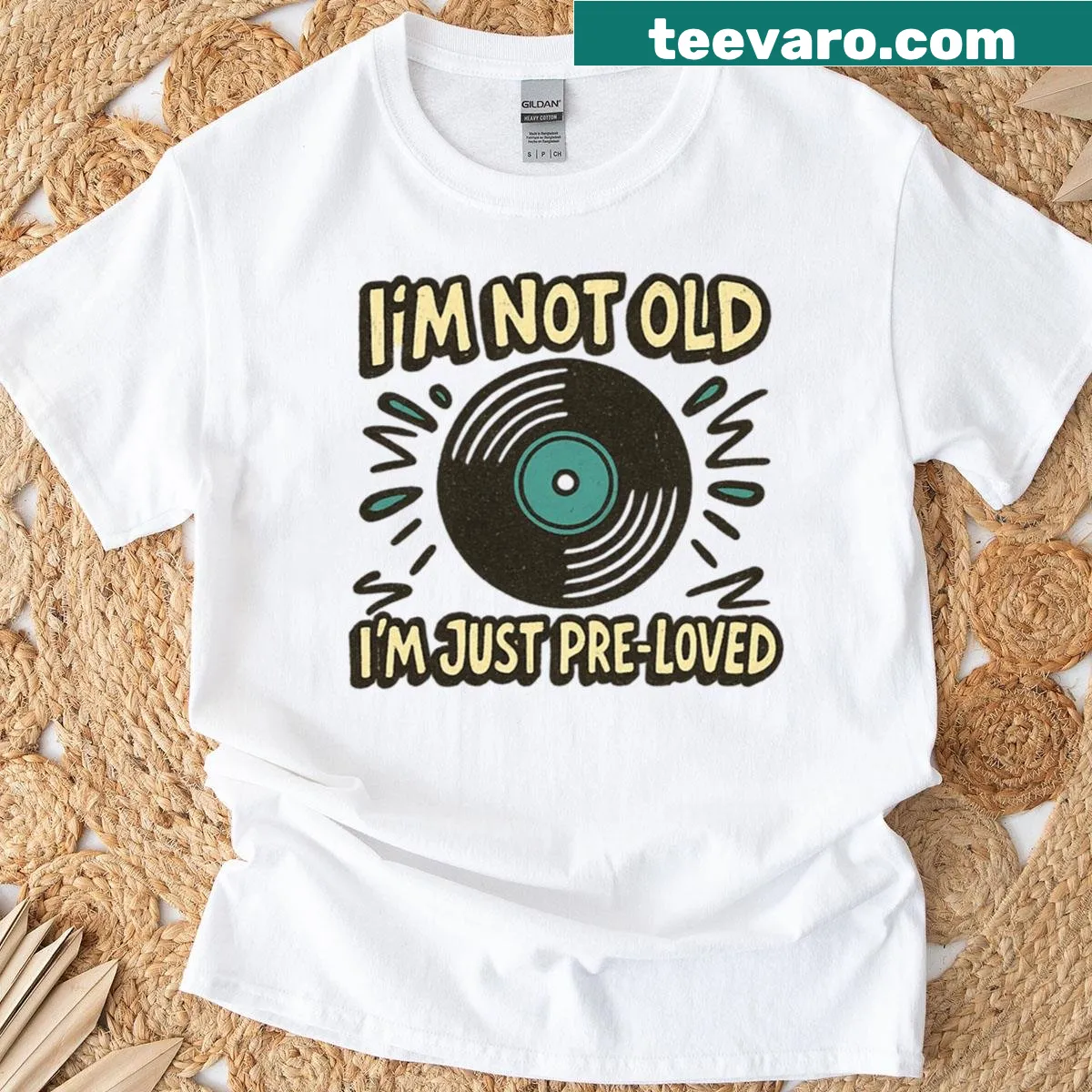 Vintage-style t-shirt with the phrase 'Not Old Just Pre-loved' in retro font — on a men's t-shirt