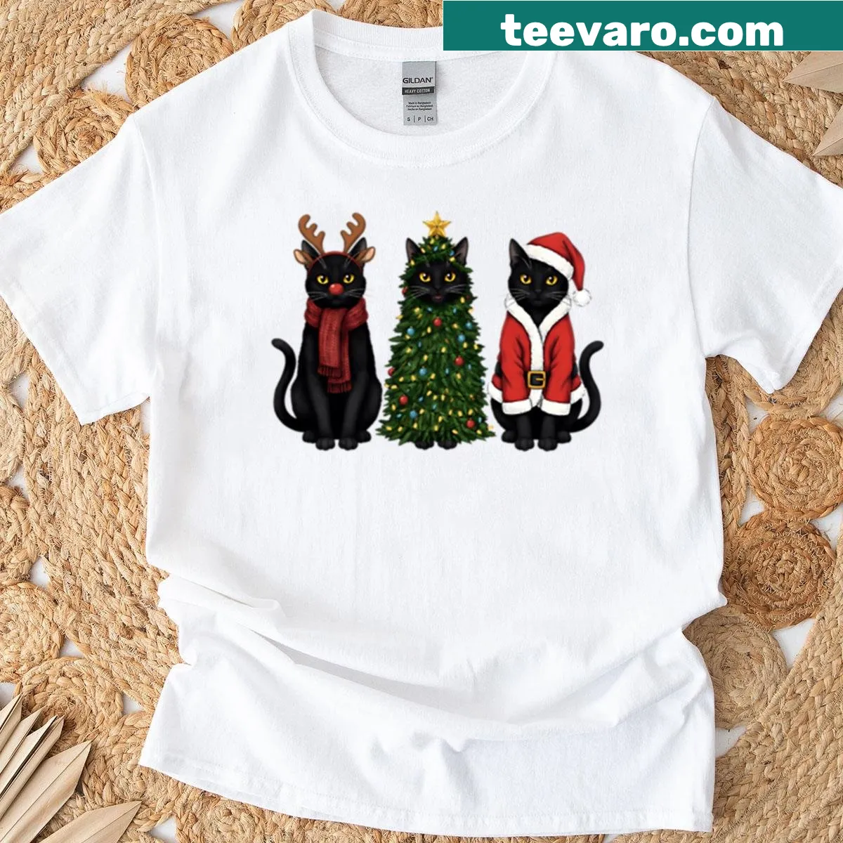 Humorous oversized t-shirt with a black cat dressed as Santa — on a men's t-shirt