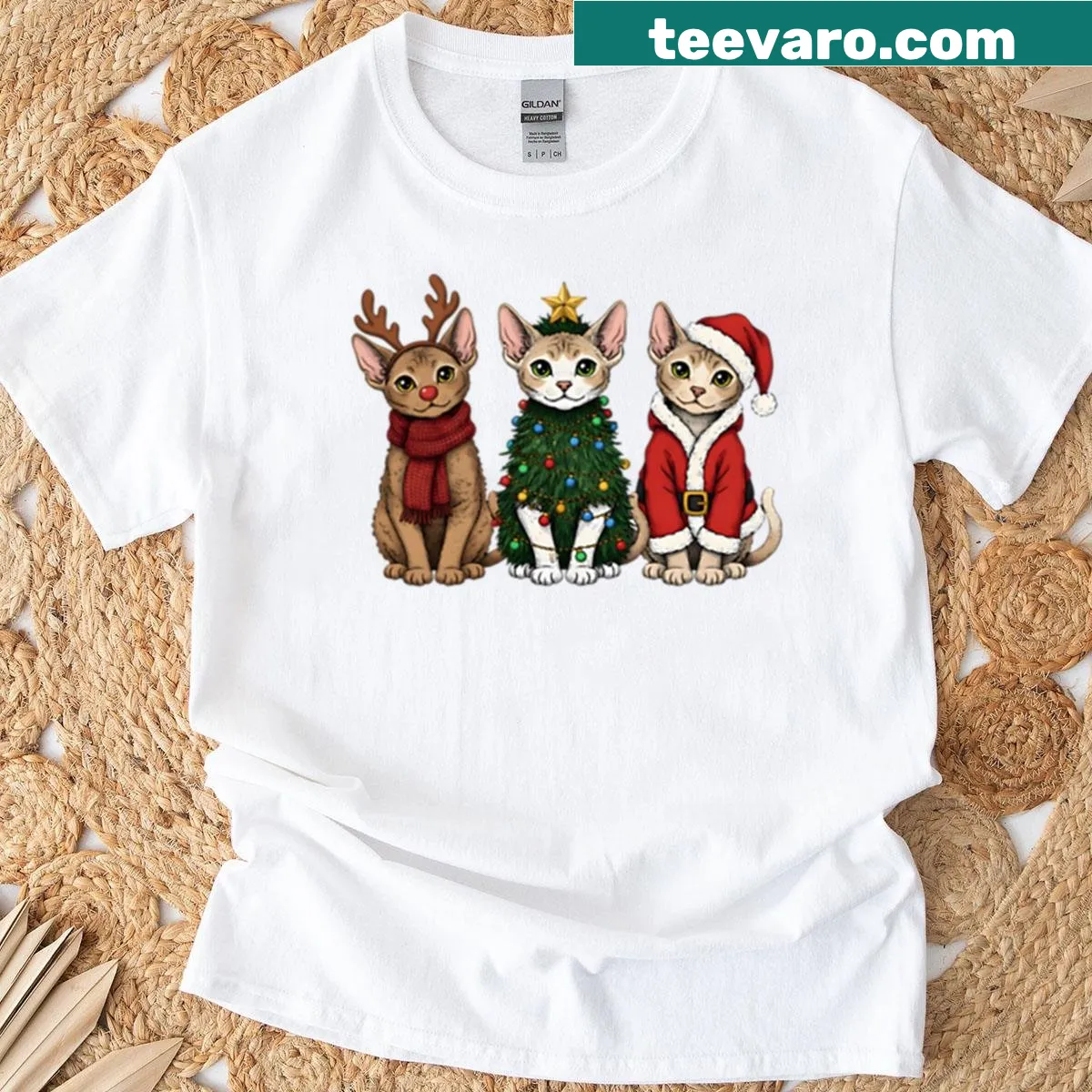 Cartoon of a Devon Rex cat as Santa with reindeer, festive design — on a men's t-shirt