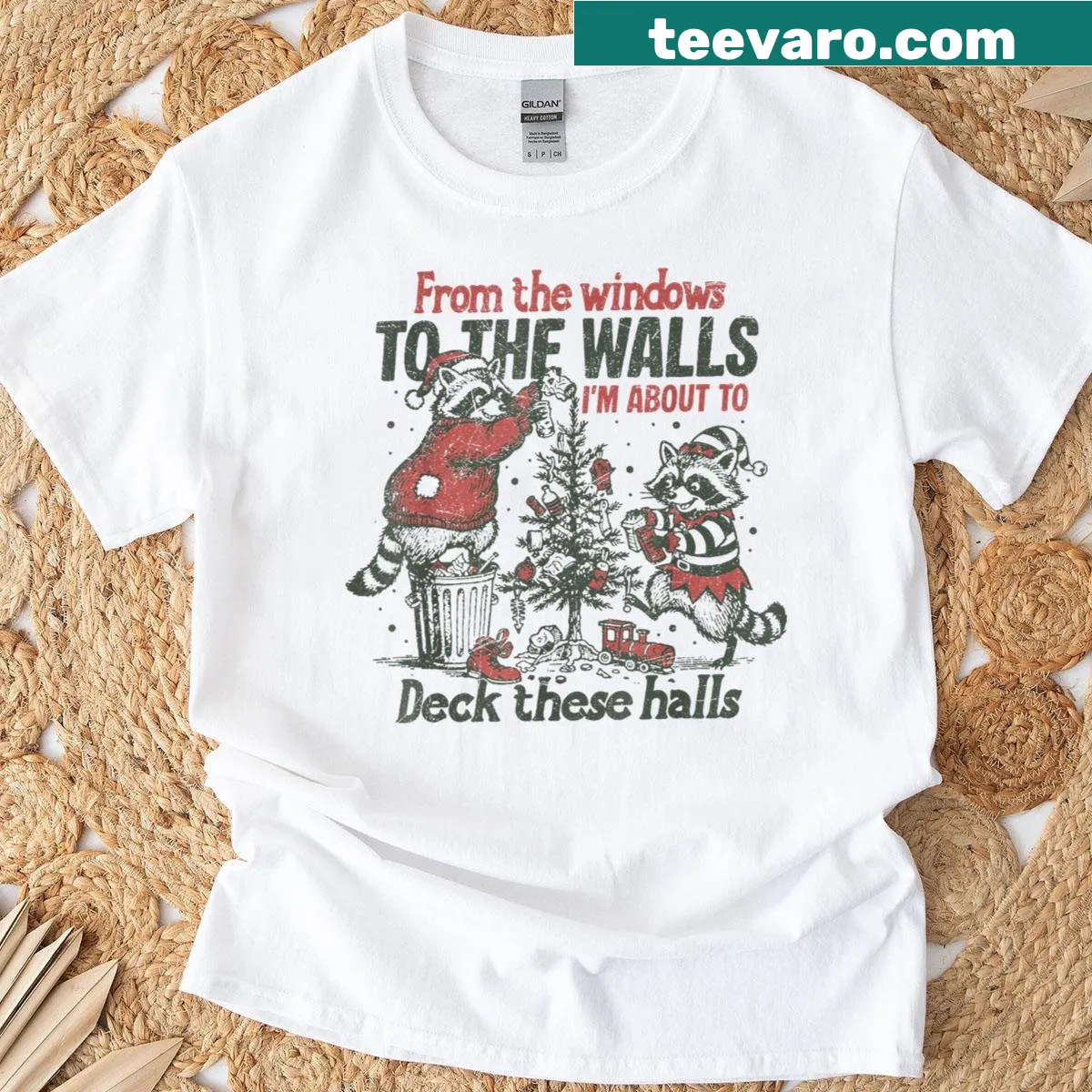 Funny Raccoon Christmas t-shirt with window graphic and humorous text — on a men's t-shirt