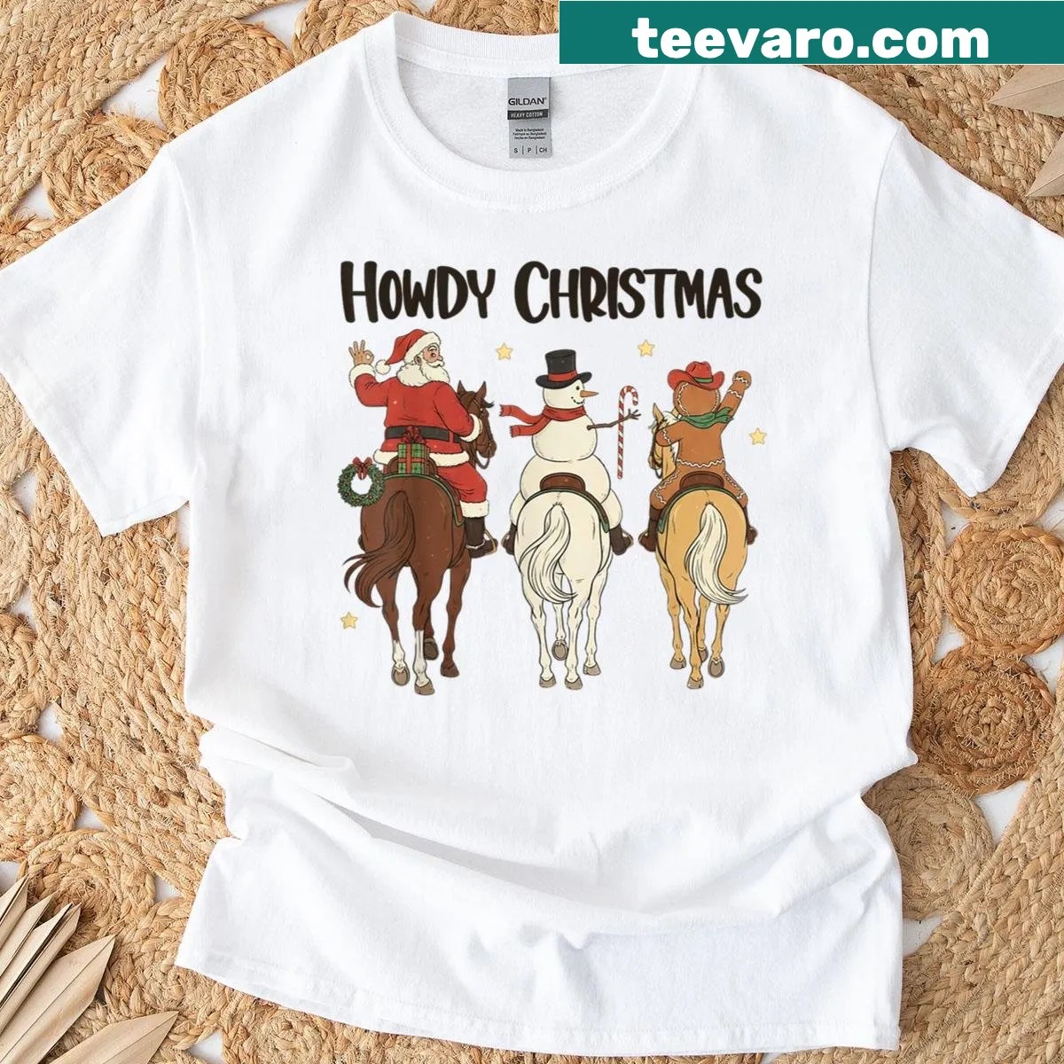 Cartoon Christmas T-shirt with Santa, snowman, and gingerbread man riding a horse. — on a men's t-shirt