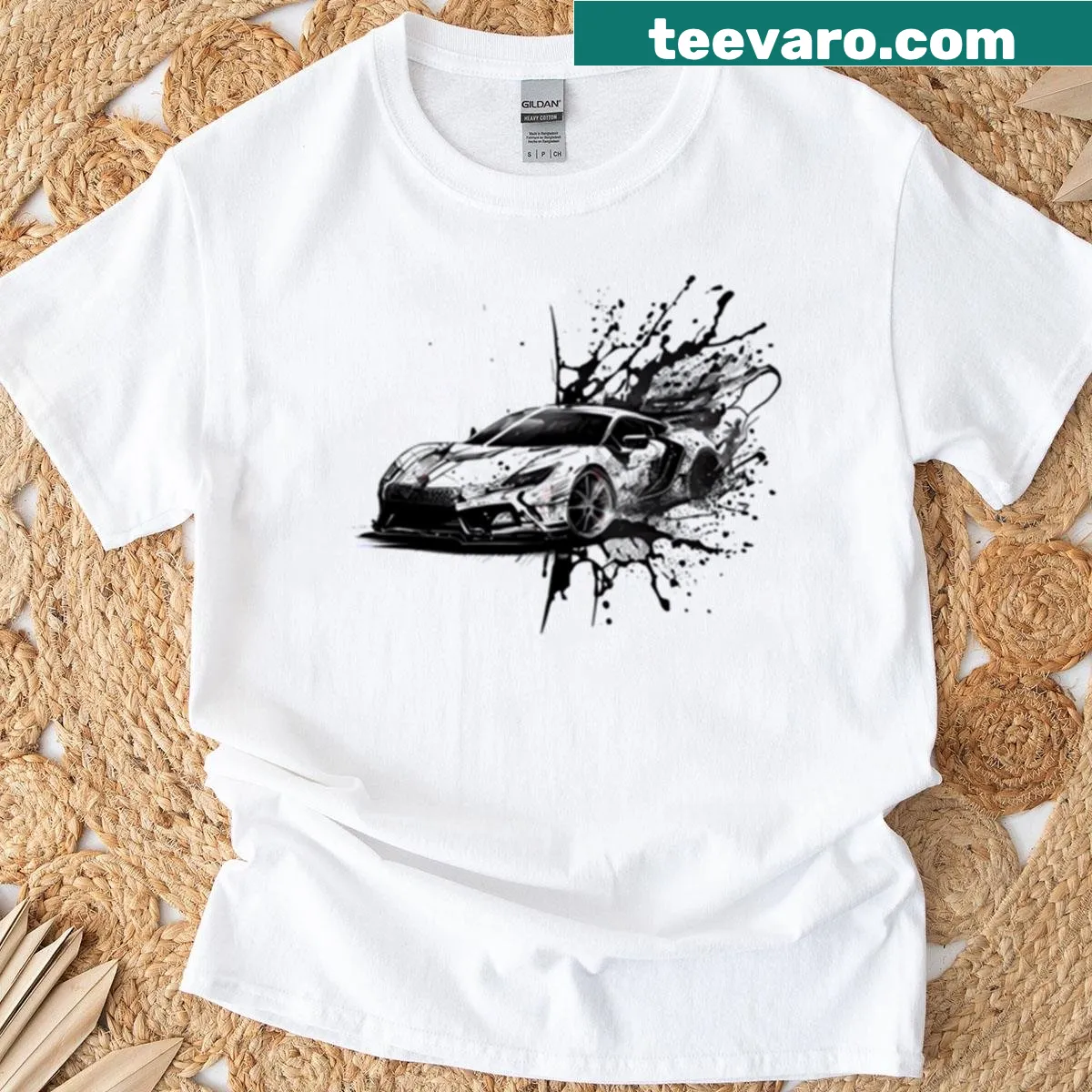 Ink splatter design featuring a sports car — on a men's t-shirt
