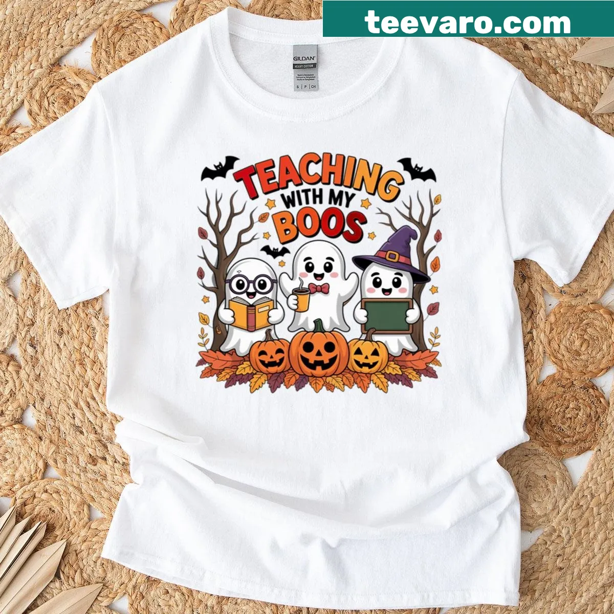 Cute Halloween-themed teacher shirt with cartoon ghosts — on a men's t-shirt