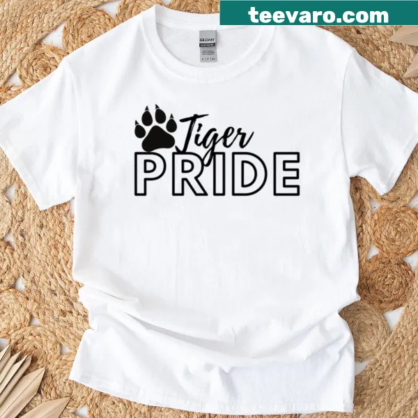 Illustrated tiger head on an oversized T-shirt representing pride.