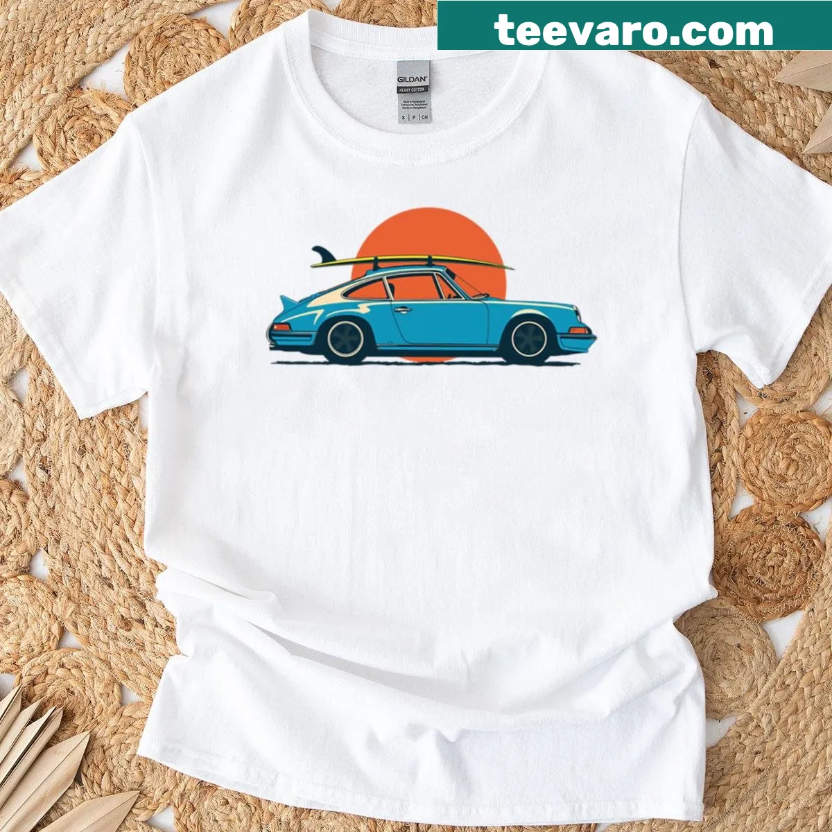 Illustrated vintage T-shirt featuring a blue Porsche 911 964 Rs with a surf theme. — on a men's t-shirt