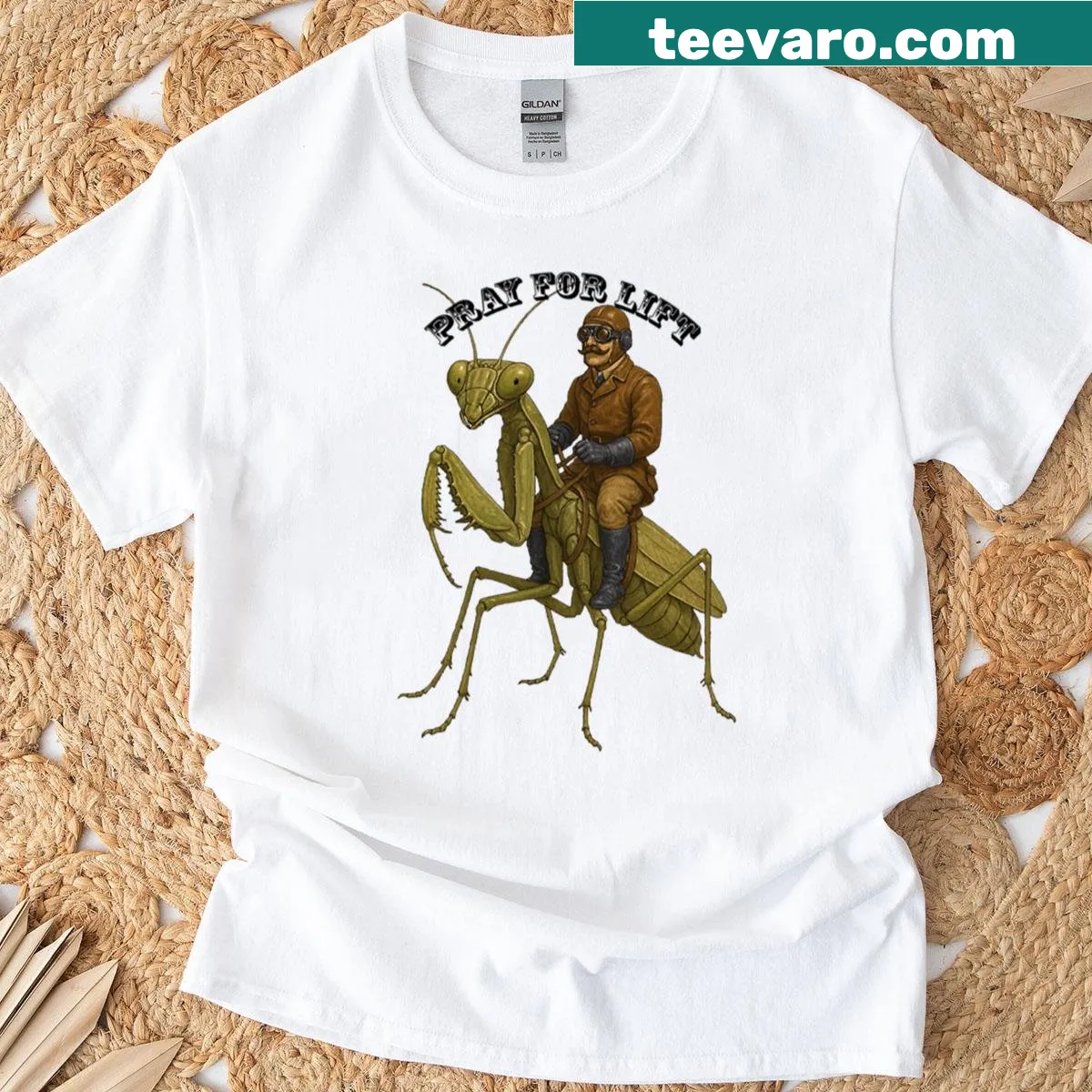 Vintage t-shirt with a pilot riding a giant praying mantis — on a men's t-shirt