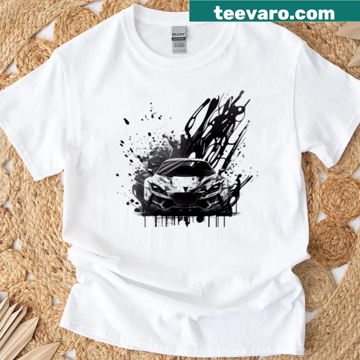 Silhouette sports car on ink splatter T-shirt — on a men's t-shirt