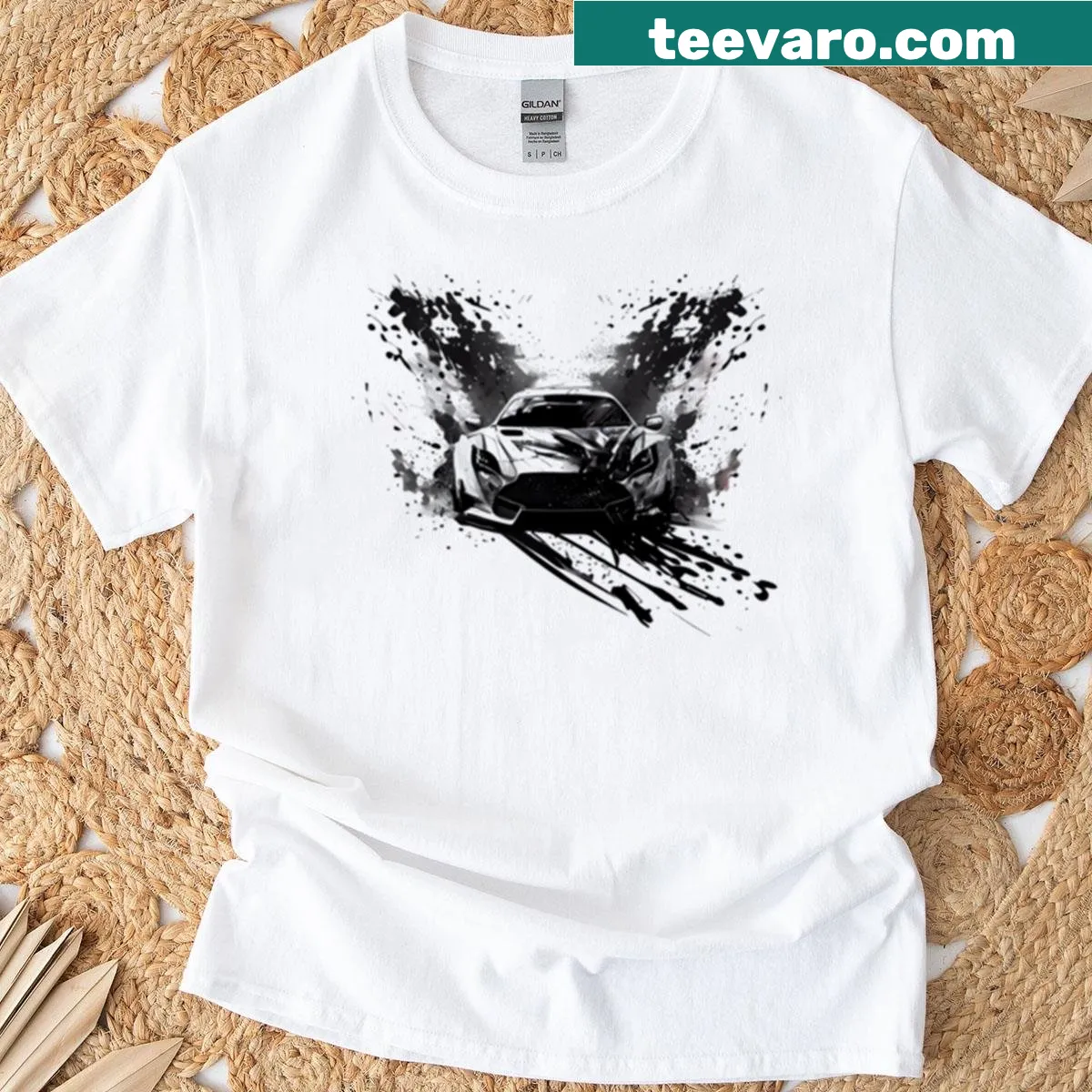 Ink splatter graphic featuring a white sports car on a t-shirt — on a men's t-shirt