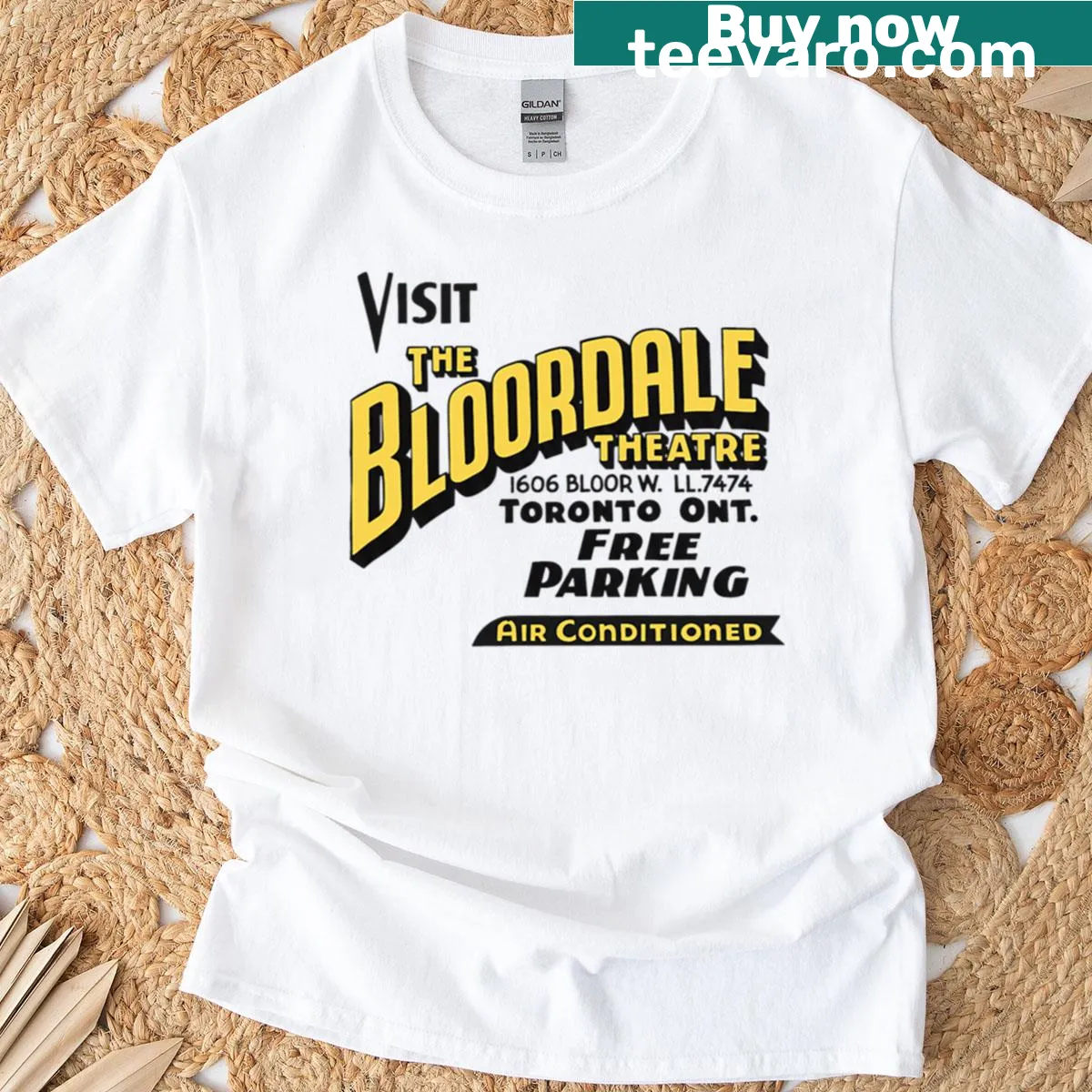 Vintage-style T-shirt featuring a graphic of the Bloordale Theatre in Toronto. — on a men's t-shirt