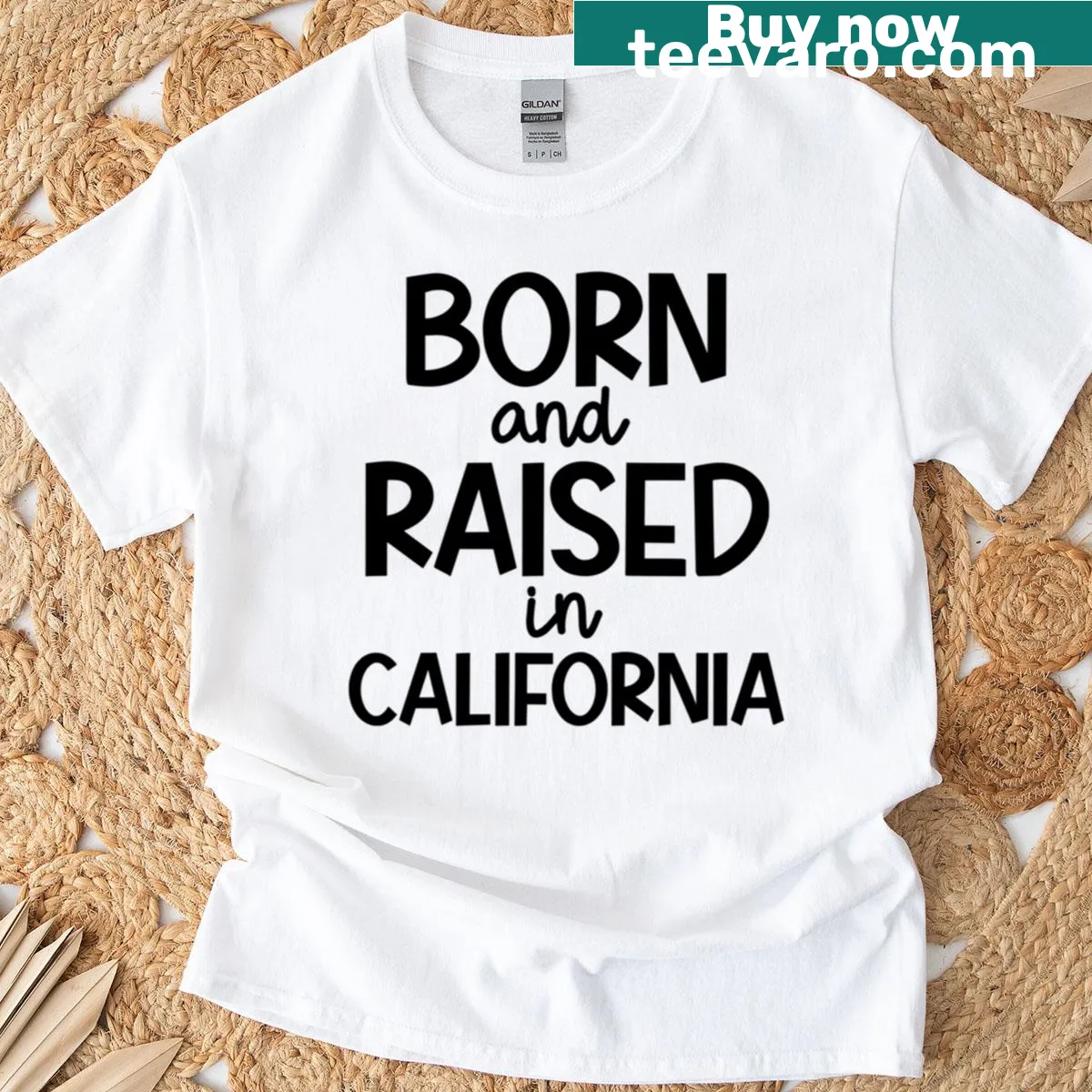 T-shirt with 'Born And Raised In California' text in bold typography — on a men's t-shirt