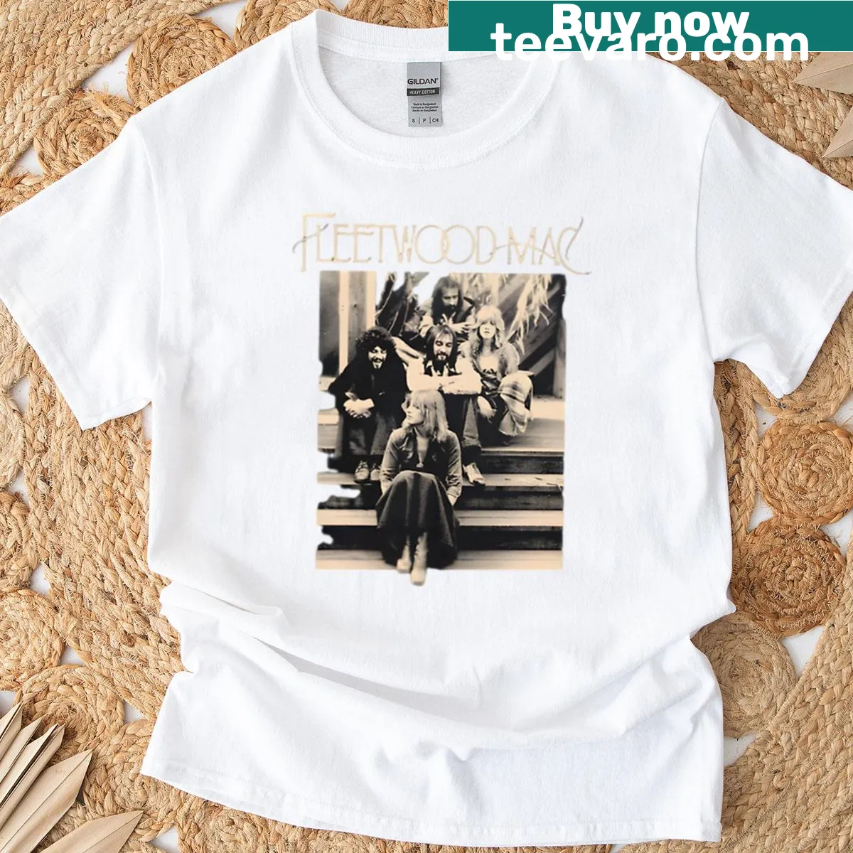 Vintage Fleetwood Mac band t-shirt with classic rock imagery — on a men's t-shirt