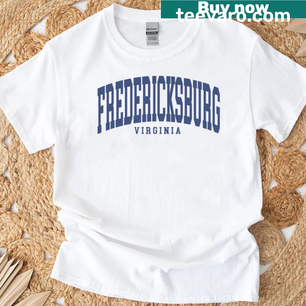 Curved typography t-shirt representing Fredericksburg, VA in college font. — on a men's t-shirt