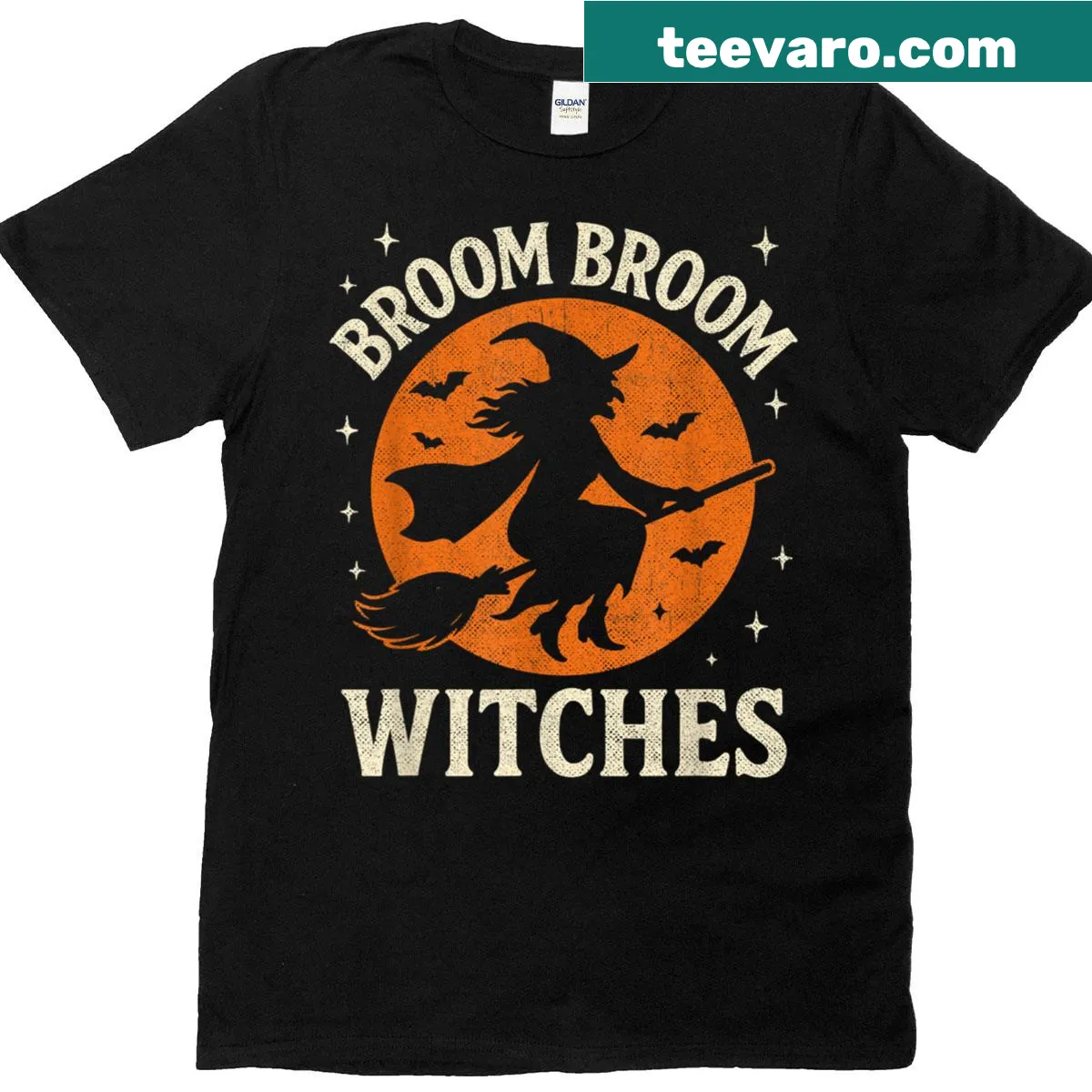 Cartoon graphic of flying witches on broomsticks for Halloween — on a men's t-shirt