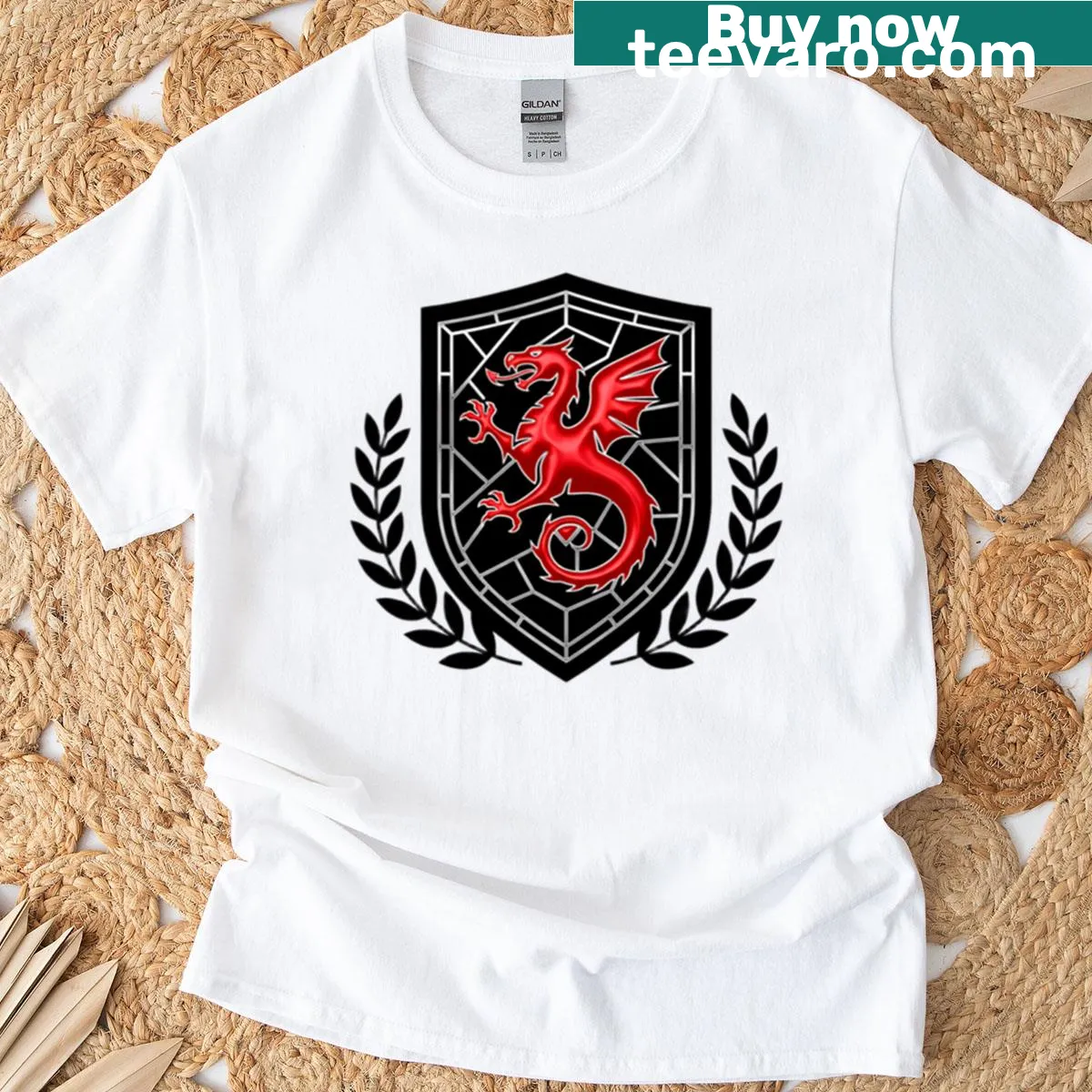 Graphic of a red dragon on a laurel shield emblem. — on a men's t-shirt